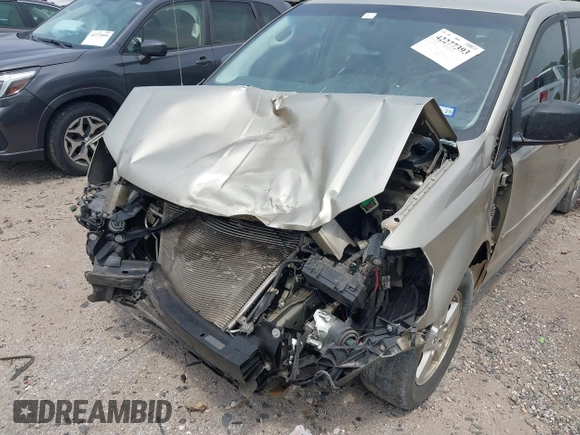 2009 Dodge Grand Caravan SE z VIN 1D8HN44E99B509833, wystawiony jako IAAI lot #42277393 z przebiegiem Nie podano mil oraz . Historia ofert i sprzedaży dostępna na DreamBid. Obrazek 6.