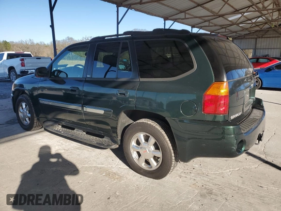 2004 GMC Envoy SLT z VIN 1GKDS13S942127830, wystawiony jako Copart lot #87165024 z przebiegiem 172 592 mil mil oraz Szkoda całkowita • Salvage title. Historia ofert i sprzedaży dostępna na DreamBid. Obrazek 2.