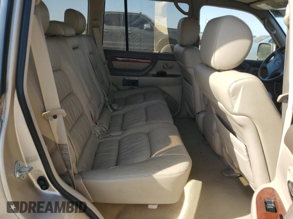 2001 Lexus LX 470 z VIN JTJHT00W213507042, wystawiony jako Copart lot #52634195 z przebiegiem 179 707 mil mil oraz Tytuł czysty. Historia ofert i sprzedaży dostępna na DreamBid. Obrazek 11.