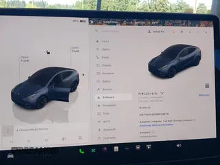 2024 Tesla Model Y Long Range z VIN 7SAYGAEE8RF088791, wystawiony jako IAAI lot #42185399 z przebiegiem 15 339 mil mil oraz . Historia ofert i sprzedaży dostępna na DreamBid. Obrazek 7.