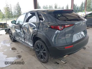 2023 Mazda CX-30 S Carbon Edition with VIN 3MVDMBCM1PM558865, listed as a IAAI auction lot 42298416 with 19,276 mi miles and . Bid and sale history available at DreamBid. Image 3.