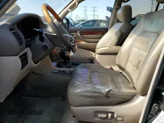 2002 Lexus LX 470 z VIN JTJHT00W923521442, wystawiony jako Copart lot #55936255 z przebiegiem 184 103 mil mil oraz Tytuł czysty. Historia ofert i sprzedaży dostępna na DreamBid. Obrazek 7.