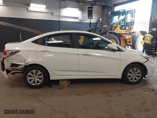 2015 Hyundai Accent GLS with VIN KMHCT4AE8FU876771, listed as a IAAI auction lot 42007229 with 63,484 mi miles. Bid and sale history available at carsss.com. Image 13.