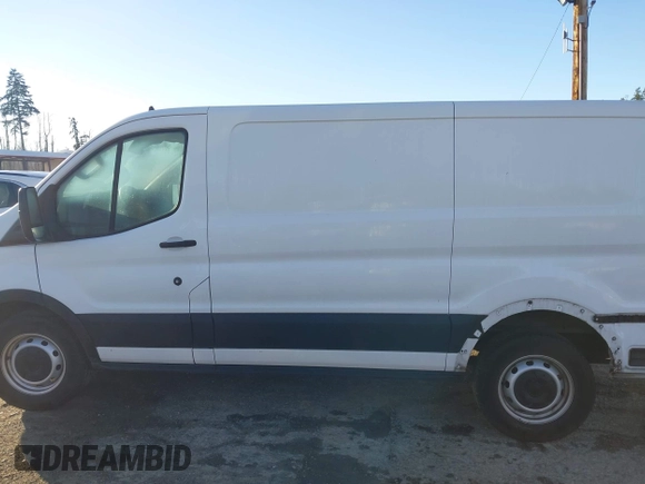 2021 Ford Transit Cargo z VIN 1FTYE1Y89MKA16809, wystawiony jako IAAI lot #41643195 z przebiegiem 7 407 mil mil oraz . Historia ofert i sprzedaży dostępna na DreamBid. Obrazek 14.