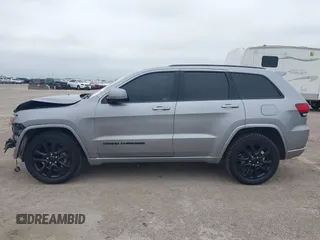 2019 Jeep Grand Cherokee Laredo E with VIN 1C4RJFAG9KC670974, listed as a IAAI auction lot 42333028 with 163,958 mi miles and . Bid and sale history available at DreamBid. Image 15.