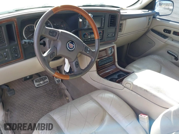 2004 Cadillac Escalade EXT z VIN 3GYEK62N94G191201, wystawiony jako IAAI lot #41747841 z przebiegiem 229 057 mil mil oraz . Historia ofert i sprzedaży dostępna na DreamBid. Obrazek 13.