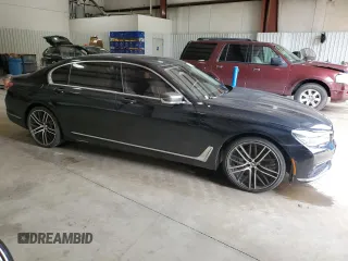 2017 BMW 7 Series 740i with VIN WBA7E2C36HG741125, listed as a Copart auction lot 55754185 with 90,305 mi miles and Clean Title. Bid and sale history available at DreamBid. Image 4.