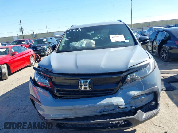 2022 Honda Pilot Sport z VIN 5FNYF5H34NB016711, wystawiony jako IAAI lot #41175815 z przebiegiem 28 635 mil mil oraz . Historia ofert i sprzedaży dostępna na DreamBid. Obrazek 12.