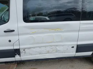 2019 Ford Transit with VIN 1FTYR2CM4KKA63287, listed as a IAAI auction lot 41910079 with 95,472 mi miles. Bid and sale history available at carsss.com. Image 6.
