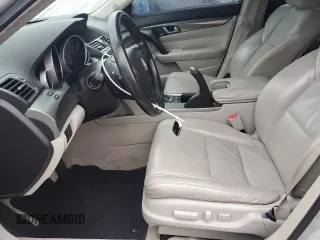 2010 Acura TL Technology z VIN 19UUA8F57AA018220, wystawiony jako Copart lot #59928325 z przebiegiem 136 319 mil mil oraz Szkoda całkowita • Salvage title. Historia ofert i sprzedaży dostępna na DreamBid. Obrazek 7.