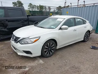 2018 Nissan Altima SR with VIN 1N4AL3AP7JC174856, listed as a IAAI auction lot 42070366 with 135,680 mi miles and . Bid and sale history available at carsss.com. Image 9.
