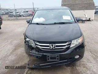 2015 Honda Odyssey Touring Elite with VIN 5FNRL5H97FB124565, listed as a IAAI auction lot 42358412 with 206,444 mi miles and . Bid and sale history available at DreamBid. Image 13.