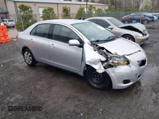 2010 Toyota Yaris with VIN JTDBT4K38A1363060, listed as a IAAI auction lot 41874903 with 170,398 mi miles. Bid and sale history available at carsss.com. Image 1.