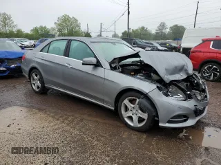 2014 Mercedes-Benz E 350 Luxury with VIN WDDHF8JB1EB014135, listed as a Copart auction lot 56395215 with Not provided miles and Salvage title. Bid and sale history available at DreamBid. Image 4.