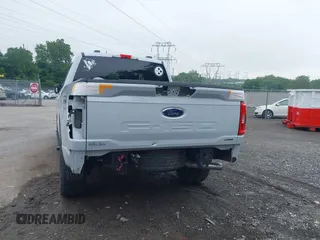 2021 Ford F-150 XL z VIN 1FTEW1EP5MKE17091, wystawiony jako IAAI lot #42413293 z przebiegiem 57 042 mil mil oraz . Historia ofert i sprzedaży dostępna na DreamBid. Obrazek 22.