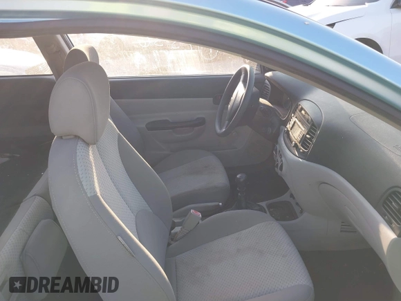 2008 Hyundai Accent GS with VIN KMHCM36C68U103086, listed as a IAAI auction lot 41792536 with 100,721 mi miles. Bid and sale history available at carsss.com. Image 5.