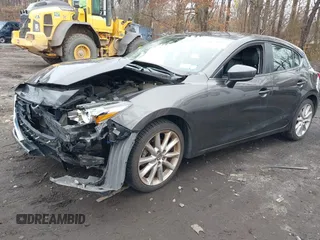 2017 Mazda 3 Touring with VIN 3MZBN1L7XHM135792, listed as a IAAI auction lot 41732569 with 81,368 mi miles and . Bid and sale history available at DreamBid. Image 2.