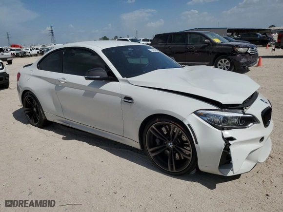 2018 BMW M2 with VIN WBS1J5C51JVD36522, listed as a Copart auction lot 61423854 with 57,933 mi miles and Salvage Title. Bid and sale history available at carsss.com. Image 4.