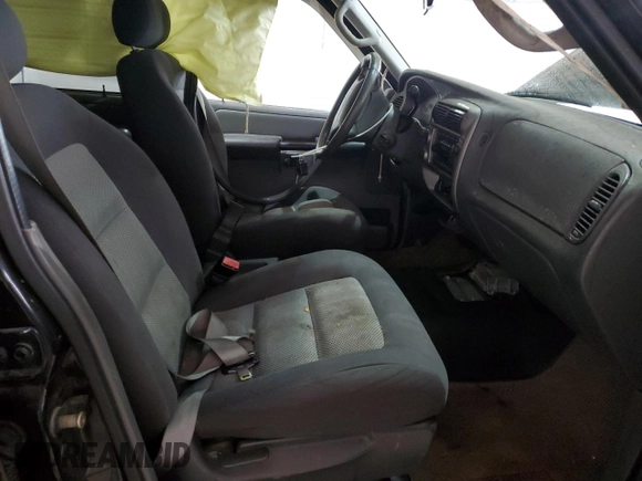 2005 Ford Explorer Sport Trac XLS with VIN 1FMDU77KX5UB63725, listed as a Copart auction lot 49386155 with 165,293 mi miles and Salvage title. Bid and sale history available at DreamBid. Image 7.