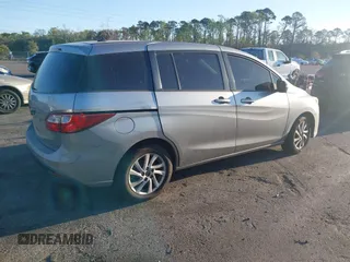 2013 Mazda 5 Sport with VIN JM1CW2BL4D0147779, listed as a IAAI auction lot 41860789 with 243,068 mi miles. Bid and sale history available at carsss.com. Image 4.