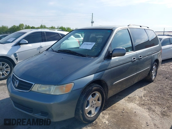 2001 Honda Odyssey EX z VIN 2HKRL18601H532141, wystawiony jako IAAI lot #41981052 z przebiegiem 126 931 mil mil oraz . Historia ofert i sprzedaży dostępna na DreamBid. Obrazek 2.