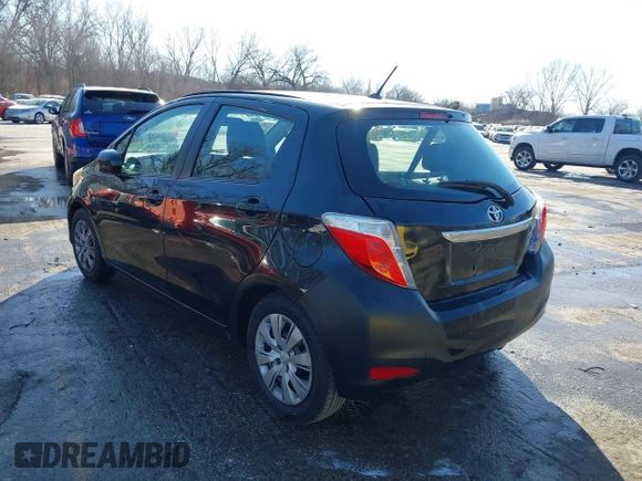 2012 Toyota Yaris L with VIN JTDKTUD31CD500337, listed as a IAAI auction lot 41410723 with 130,881 mi miles. Bid and sale history available at carsss.com. Image 3.