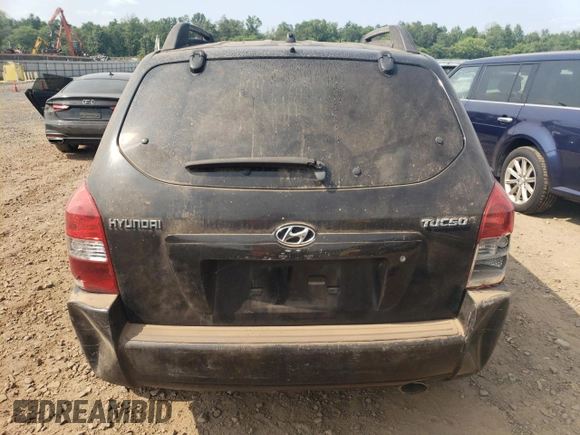 2005 Hyundai Tucson GL with VIN KM8JM12BX5U075930, listed as a Copart auction lot 67500484 with 141,028 mi miles and Salvage Title. Bid and sale history available at carsss.com. Image 6.