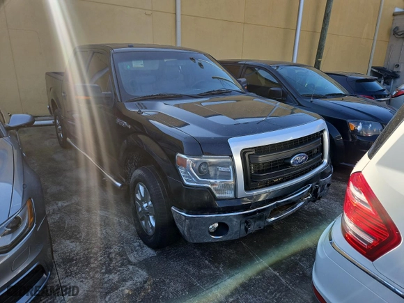 2014 Ford F-150 XL with VIN 1FTFW1CF4EKD04846, listed as a Copart auction lot 43183515 with 256,594 mi miles and Clean Title. Bid and sale history available at carsss.com. Image 1.