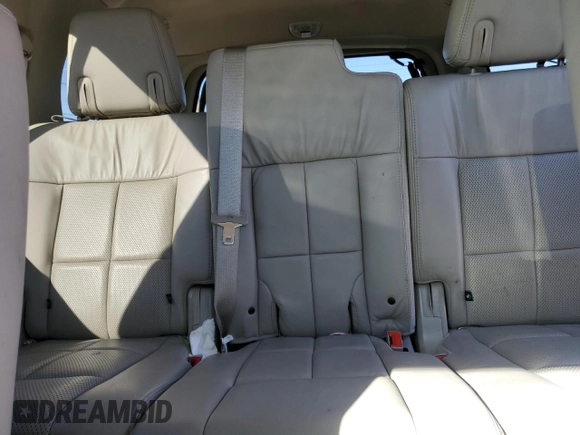 2013 Lincoln Navigator z VIN 5LMJJ2H50DEL08848, wystawiony jako Copart lot #80376764 z przebiegiem 182 163 mil mil oraz Czysty tytuł • Clean title. Historia ofert i sprzedaży dostępna na DreamBid. Obrazek 10.