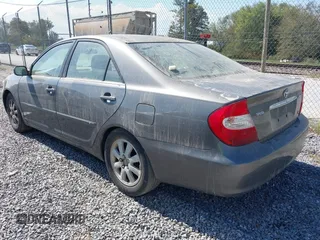 2004 Toyota Camry LE with VIN 4T1BF30K94U576450, listed as a IAAI auction lot 40541915 with Not Provided miles and . Bid and sale history available at carsss.com. Image 3.