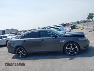 2015 Ford Taurus SEL with VIN 1FAHP2H81FG123199, listed as a IAAI auction lot 42431645 with 183,456 mi miles and . Bid and sale history available at DreamBid. Image 13.