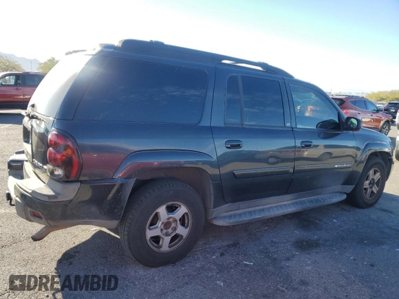 2004 Chevrolet TrailBlazer EXT LT with VIN 1GNET16P946208721, listed as a Copart auction lot 82648204 with 209,910 mi miles and Salvage Title. Bid and sale history available at carsss.com. Image 3.