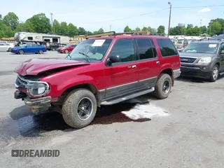 2000 Ford Explorer XLT z VIN 1FMZU73E7YZB60956, wystawiony jako IAAI lot #42218666 z przebiegiem 234 289 mil mil oraz . Historia ofert i sprzedaży dostępna na DreamBid. Obrazek 2.