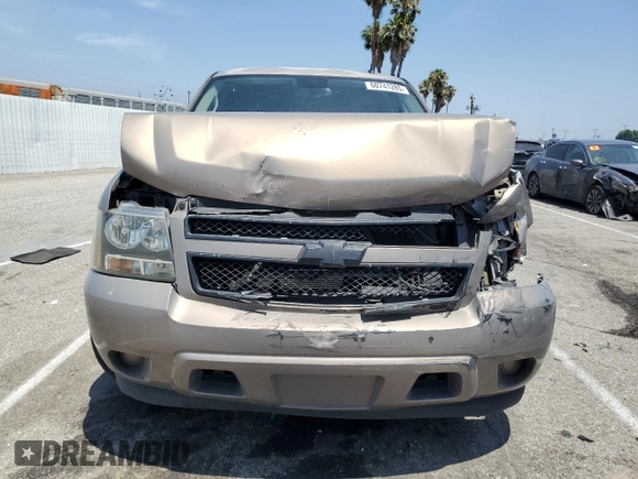 2007 Chevrolet Tahoe LS with VIN 1GNFC13J47R151058, listed as a Copart auction lot 60741285 with 210,749 mi miles and Salvage title. Bid and sale history available at DreamBid. Image 5.