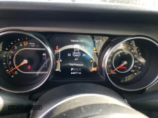 2019 Jeep Wrangler Unlimited Sport S with VIN 1C4HJXDG6KW582301, listed as a Copart auction lot 43180525 with 64,477 mi miles and Salvage title. Bid and sale history available at DreamBid. Image 9.