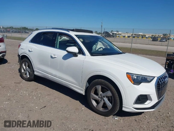 2021 Audi Q3 Premium with VIN WA1AUCF32M1097059, listed as a IAAI auction lot 41825132 with 66,144 mi miles and . Bid and sale history available at DreamBid. Image 1.