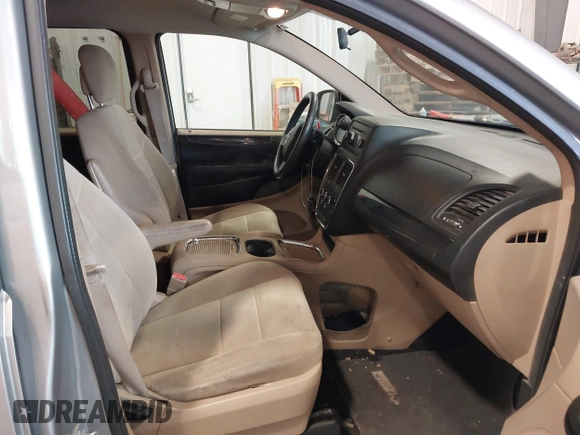 2014 Dodge Grand Caravan SXT with VIN 2C4RDGCG9ER213426, listed as a IAAI auction lot 41044553 with 175,140 mi miles and . Bid and sale history available at DreamBid. Image 5.