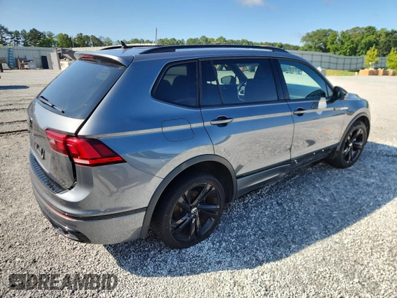 2023 Volkswagen Tiguan SE R-Line Black with VIN 3VVCB7AX3PM056471, listed as a Copart auction lot 60679225 with 94,752 mi miles and Clean title. Bid and sale history available at DreamBid. Image 3.