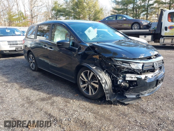 2024 Honda Odyssey Touring z VIN 5FNRL6H89RB042354, wystawiony jako IAAI lot #41469495 z przebiegiem 8 477 mil mil oraz . Historia ofert i sprzedaży dostępna na DreamBid. Obrazek 1.