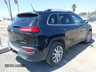 2014 Jeep Cherokee Limited with VIN 1C4PJMDB9EW210180, listed as a IAAI auction lot 41302037 with 75,177 mi miles and . Bid and sale history available at DreamBid. Image 4.