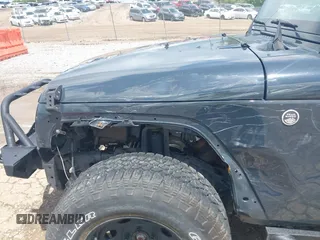 2018 Jeep Wrangler Unlimited Sport S with VIN 1C4BJWDG1JL849635, listed as a IAAI auction lot 42060964 with 60,405 mi miles and . Bid and sale history available at DreamBid. Image 17.