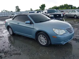 2009 Chrysler Sebring Touring with VIN 1C3LC55D89N501445, listed as a IAAI auction lot 41921893 with 166,149 mi miles and . Bid and sale history available at DreamBid. Image 1.