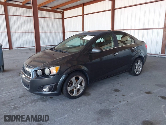 2016 Chevrolet Sonic LTZ z VIN 1G1JE5SB6G4160588, wystawiony jako IAAI lot #41843199 z przebiegiem 176 581 mil mil oraz . Historia ofert i sprzedaży dostępna na DreamBid. Obrazek 2.