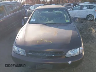 1999 Nissan Altima XE with VIN 1N4DL01D1XC193705, listed as a IAAI auction lot 40880059 with 183,605 mi miles. Bid and sale history available at carsss.com. Image 11.