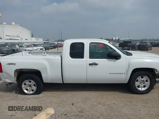 2009 Chevrolet Silverado 1500 Work Truck with VIN 1GCEK19069Z173281, listed as a IAAI auction lot 41786113 with 157,498 mi miles. Bid and sale history available at carsss.com. Image 14.