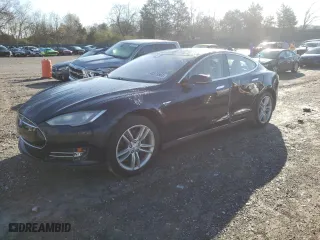 2015 Tesla Model S 85 kWh Battery with VIN 5YJSA1S11FFP73040, listed as a Copart auction lot 43379563 with 165,163 mi miles. Bid and sale history available at carsss.com. Image 1.