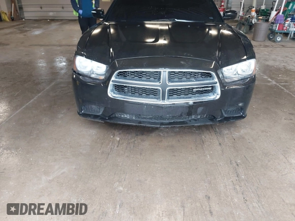 2013 Dodge Charger SE z VIN 2C3CDXBG5DH550076, wystawiony jako IAAI lot #42090715 z przebiegiem 146 020 mil mil oraz . Historia ofert i sprzedaży dostępna na DreamBid. Obrazek 6.