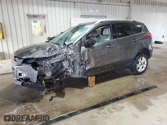 2015 Ford Escape Titanium with VIN 1FMCU9J93FUC86300, listed as a Copart auction lot 60852895 with 156,296 mi miles and Salvage title. Bid and sale history available at DreamBid. Image 1.