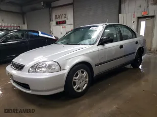 1997 Honda Civic DX with VIN 1HGEJ6624VL021651, listed as a Copart auction lot 86190384 with 135,159 mi miles and Salvage Title. Bid and sale history available at carsss.com. Image 1.