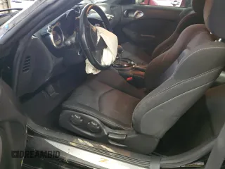 2009 Nissan 370Z z VIN JN1AZ44EX9M407193, wystawiony jako Copart lot #84891734 z przebiegiem 129 296 mil mil oraz Szkoda całkowita • Salvage title. Historia ofert i sprzedaży dostępna na DreamBid. Obrazek 7.